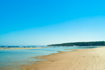 seashore, in the photo sea water against the blue sky