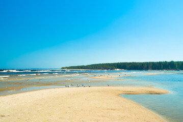 Obraz premium seashore, in the photo sea water against the blue sky