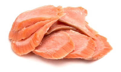 smoked salmon segments isolated on white background cutout. Prepared fish fillet fibres.
