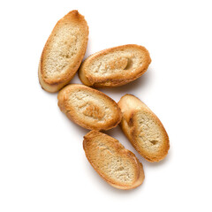 Toasted baguette slices isolated on white background close up.  Toast, crouton.   Top view.