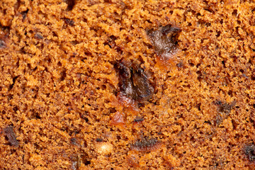 Detailed closeup of a classic date loaf, bread background.
