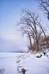 Fototapeta na wymiar Cleveland Ohio skyline from the frozen beach of lake erie