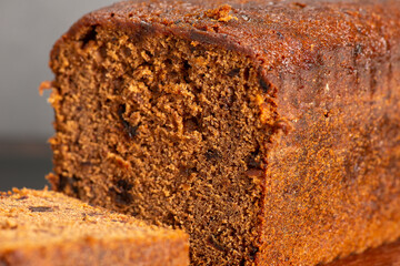 Detailed closeup of a classic date loaf, bread background.