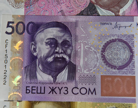 current money of kirguistan with selective focus
