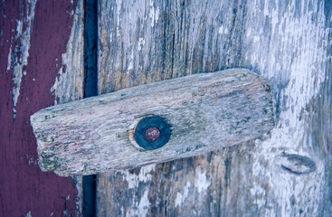 wooden door handle on a building
