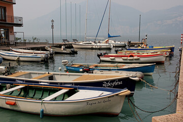 Fototapeta premium Brenzone, Boats In The Harbor, Lake Garda, Italy