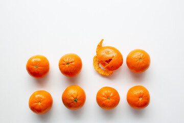 small oranges with one missing in a row
