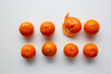 small oranges with one missing in a row
