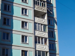 Soviet apartment building. Apartment block. Soviet architecture. Ust-Kamenogorsk (Kazakhstan). Concrete apartment buildings. Bright. Closeup detailed fragment. Plattenbau