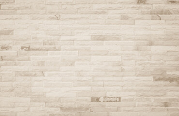 Empty background of wide cream brick wall texture. Beige old brown brick wall concrete or stone textured, wallpaper limestone abstract flooring/Grid uneven interior rock. Home decor design backdrop.