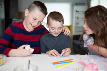 kids writing valentine's day cards