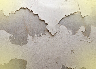 The background of the cement wall that is painted but the peeling paint and the light fair