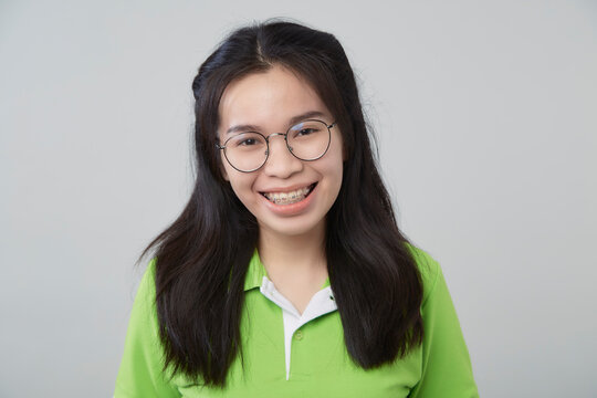 Asian woman portrait with a green shirt