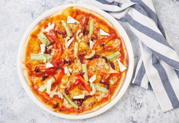Fresh Vegetarian Vegetable Pizza. Tomato and Paprika Pepper, Cucumber and Olives Cheese Mozzarella on Baked Cake Plate. Delicious Traditional Italian Classical Dish Food
