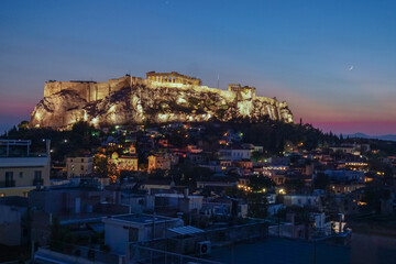 Fototapeta na wymiar Parthenon at the Acropolis from a Roof Top in Athens Greece at night