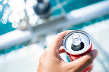 drinking canned soft drinks on the boat