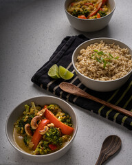 Two bowls of curry and rice