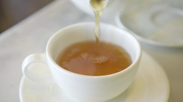 Afternoon tea, Earl Grey tea in restaurant background, 4K