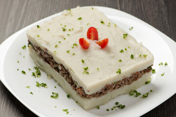 dish with mashed potato stuffed with ground beef