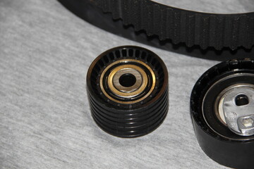Automotive Parts - New Engine Attachment Belt Rollers. New drive belt rollers for car engine accessories.