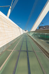 The sidewalk with a glass floor, above the famous String Bridge at the entrance to the city of Jerusalem,