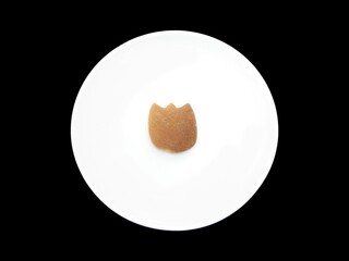 Homemade Tulip shaped cookie on a white plate