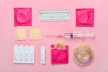 Different contraceptives on color background