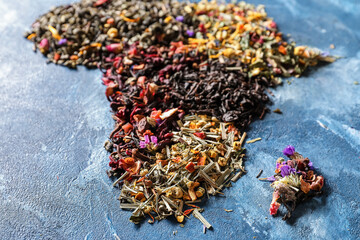 Continent Africa made of different sorts of tea on color background