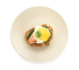 Plate of tasty sandwich with florentine egg on white background