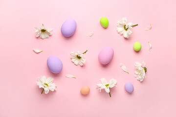 Fototapeta na wymiar Beautiful Easter composition with eggs and spring flowers on color background