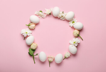 Beautiful Easter composition with eggs and spring flowers on color background