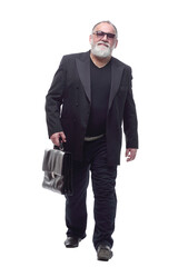 senior business man with a briefcase . isolated on a white background.