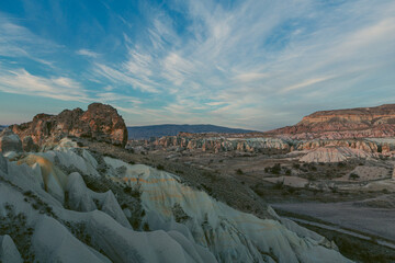 landscape of the rose valley in cappadocia with dramatic sky