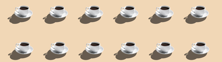 Set of coffee cups on saucer isolated on beige background with free space for text
