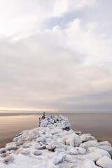 Tuja coast of Vidzeme sea shore Rīgas jūras līcis Gulf of Riga winter sunset vertical rock formation path narrow 