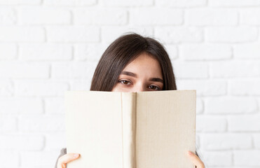 Close up of woman reading a book