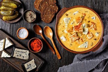 Pork stew with pickles, and blue mold cheese