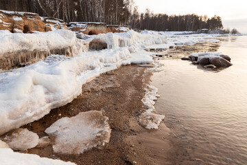 Veczemju klintis colorful group of sandstone cliffs coast of Vidzeme sea shore Rīgas jūras līcis Gulf of Riga winter ice formations