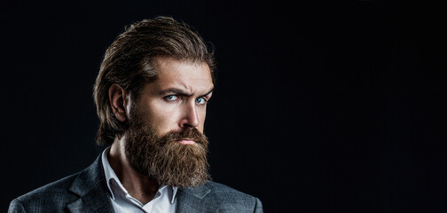 Elegant handsome man in suit. Handsome bearded businessman. Portrait of handsome bearded man in suit. Male beard and mustache. Sexy male, brutal macho, hipster