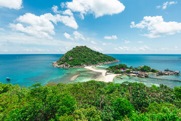 islands connected by a white sand beach in thailand