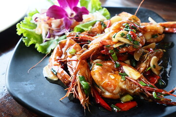 Garlic Fried Shrimp is a very spicy dish that is perfect for eating with alcoholic beverages.