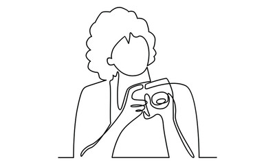 Continue line of woman holding digital camera