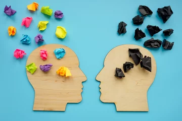 Foto op Plexiglas Negative and positive thinking concept. Head shapes with color paper balls. © Vitalii Vodolazskyi