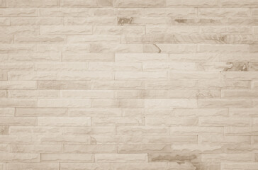 Obraz premium Empty background of wide cream brick wall texture. Beige old brown brick wall concrete or stone textured, wallpaper limestone abstract flooring/Grid uneven interior rock. Home decor design backdrop.