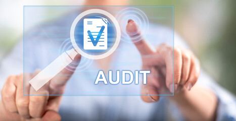 Woman touching an audit concept
