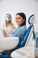 Positive delighted patient looking straight at camera