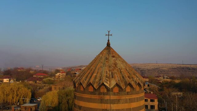 Aerial view church dome of St.Gevorg church, Armenia. Saint Gevork Monastery of Mughni,	Armenian Apostolic Church aerial footage.