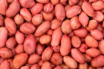 Obraz premium red peanuts background 