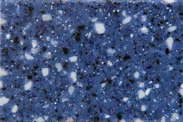 Texture of decorative artificial acrylic stone. Stone sample for bathroom, kitchen countertops furniture. Stone texture for modern interior design.