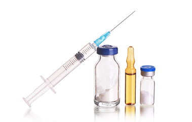 Medical syringe with medicines in ampoules on a white background